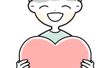 ハートを持つ笑顔の男の子